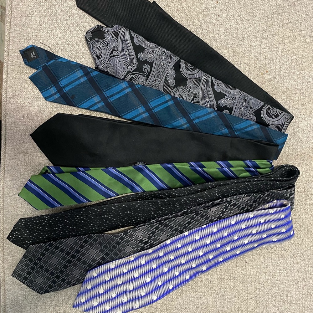 8 ties with different brand names